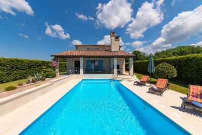 Poreč, surroundings, detached stone house with a pool and sea view