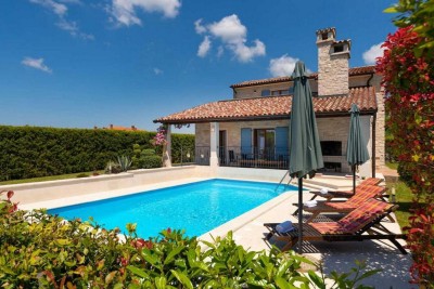 Poreč, surroundings, detached stone house with a pool and sea view